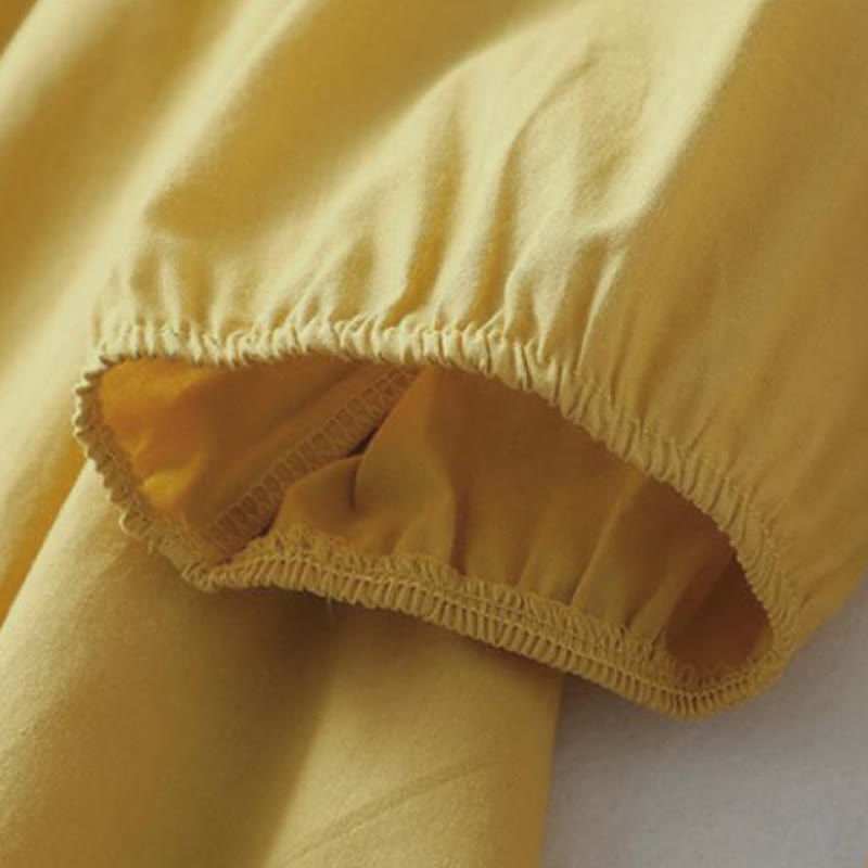 Chemise décontractée en coton et lin à manches mi-longues et col à volants pour femme avec boutons grenouille et Buddha Stones