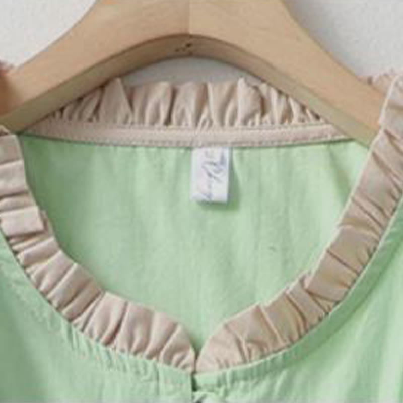 Chemise décontractée en coton et lin à manches mi-longues et col à volants pour femme avec boutons grenouille et Buddha Stones