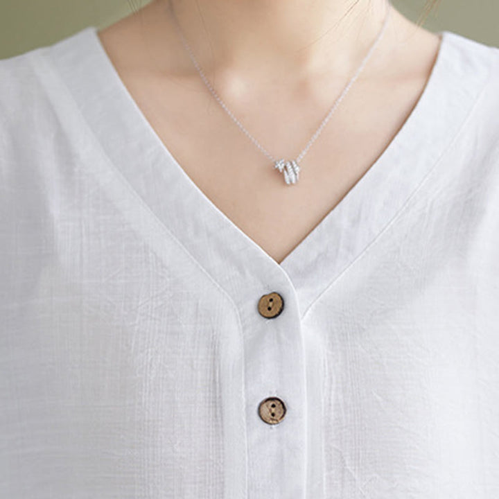 Chemise décontractée à manches courtes en viscose pour femme avec col en V et Buddha Stones