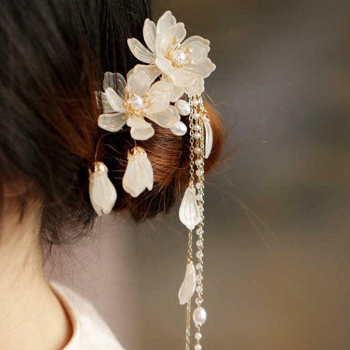 Pince à cheveux latérale classique à pompon en magnolia de Buddha Stones