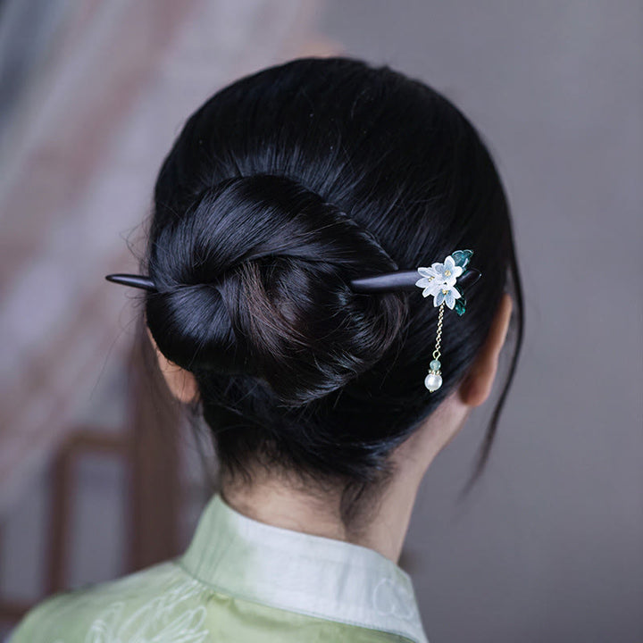 Épingle à cheveux en bois avec pompon et perles de muguet et Buddha Stones