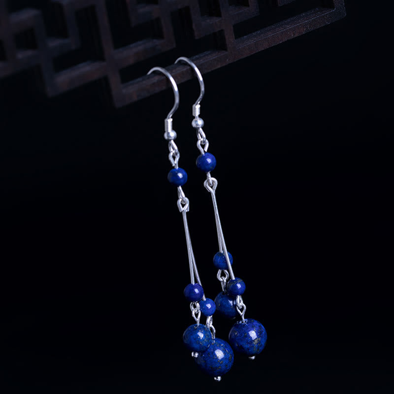 Boucles d'oreilles pendantes Sérénité en argent sterling 925 et perles de lazurite avec pierres de Buddha Stones - image 1