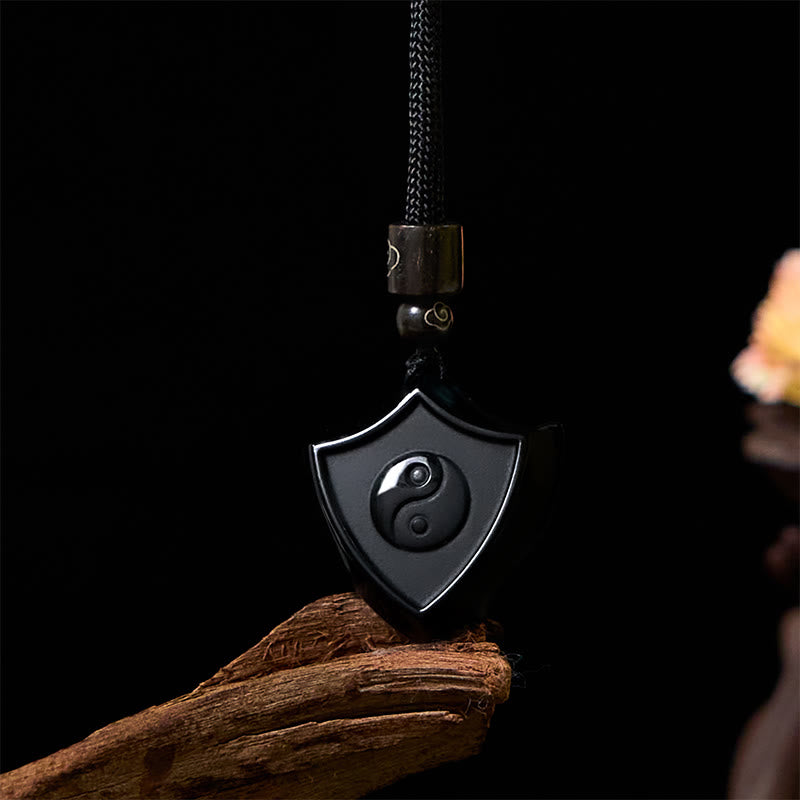 Collier pendentif en obsidienne noire avec motif de bouclier en Buddha Stones , symbole Yin Yang, force - Bouclier YIN YANG - image 1