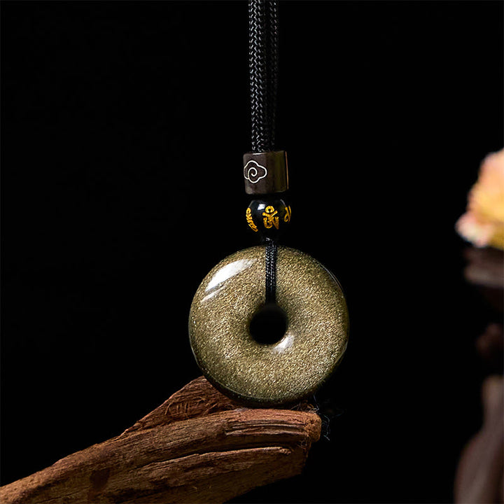 Collier avec pendentif en obsidienne naturelle dorée et brillante de Buddha Stones