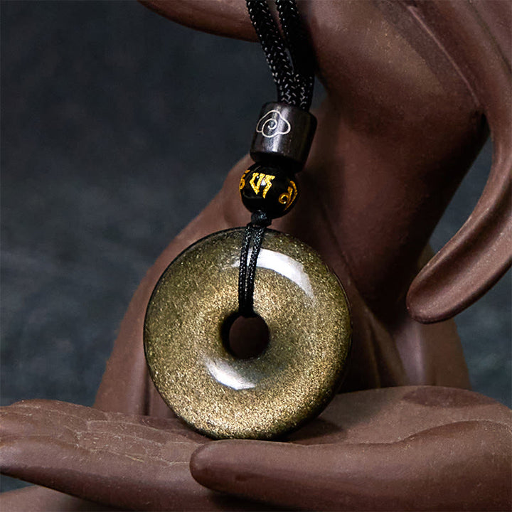 Collier avec pendentif en obsidienne naturelle dorée et brillante de Buddha Stones