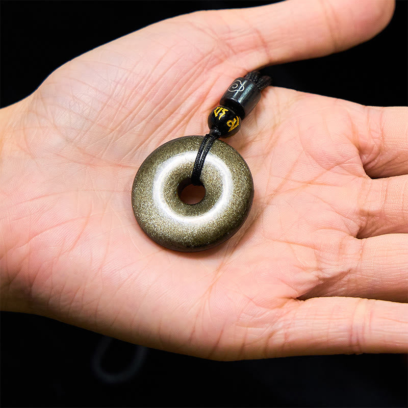 Collier avec pendentif en obsidienne naturelle dorée et brillante de Buddha Stones