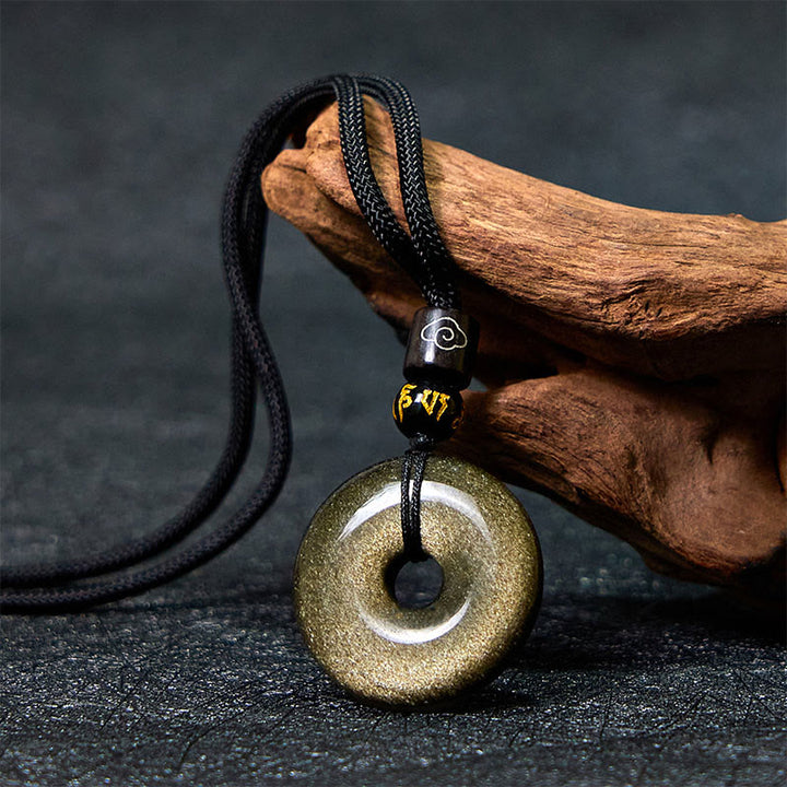 Collier avec pendentif en obsidienne naturelle dorée et brillante de Buddha Stones