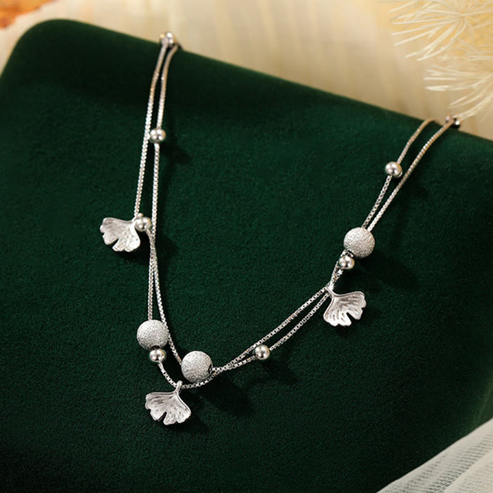 Buddha Stones double couche en argent sterling 925 avec protection en forme de feuille de ginkgo