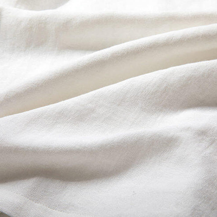 Chemise homme en lin blanc à manches trois-quarts et boutons grenouille Buddha Stones