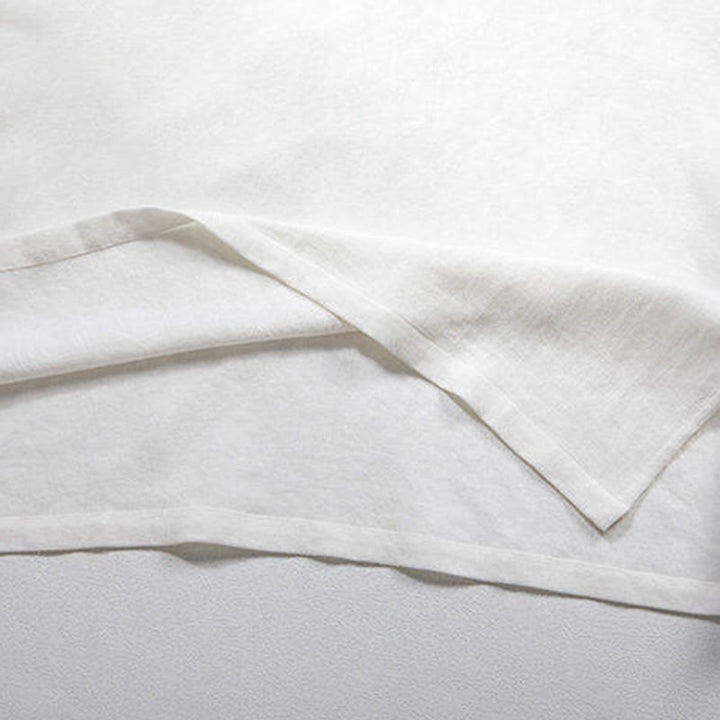 Chemise homme en lin blanc à manches trois-quarts et boutons grenouille Buddha Stones
