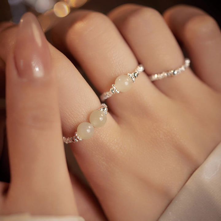 Bague élastique porte-bonheur en argent sterling 925 avec petites perles de jade Hetian naturelles et pierres de Buddha Stones