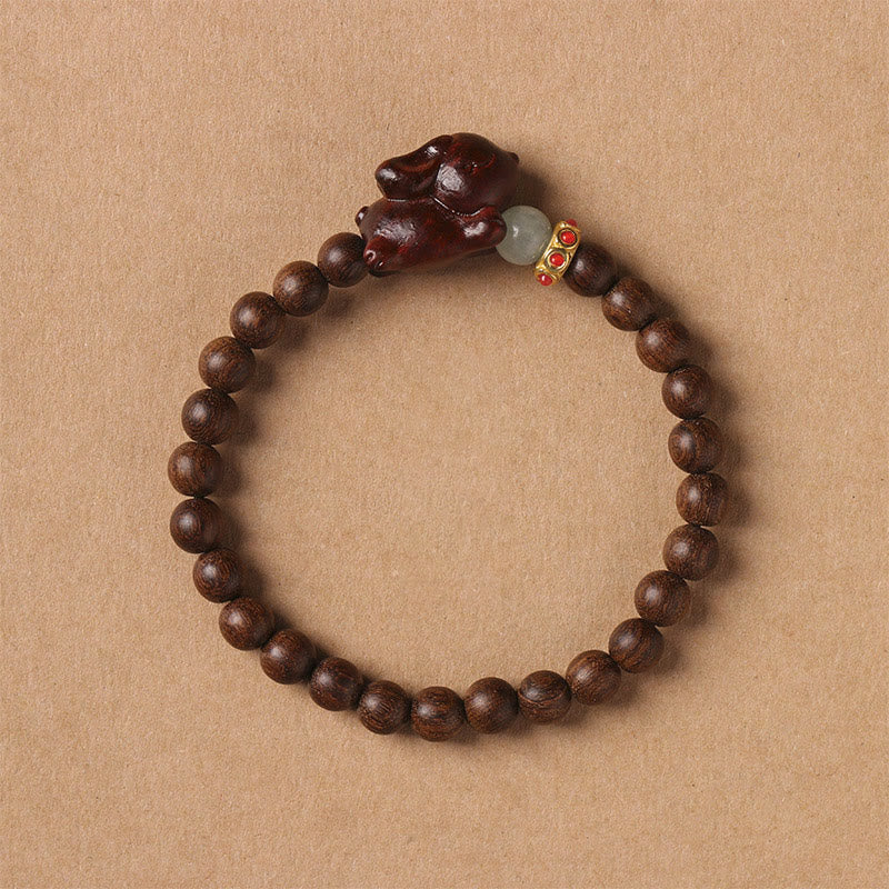 Bracelet positif en bois de santal vert et doré avec Buddha Stones et lapin mignon