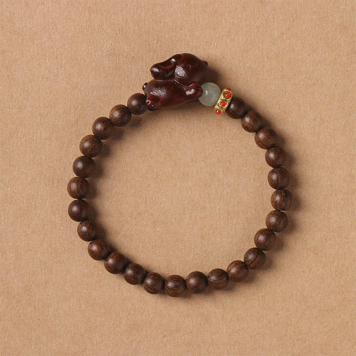 Bracelet positif en bois de santal vert et doré avec Buddha Stones et lapin mignon