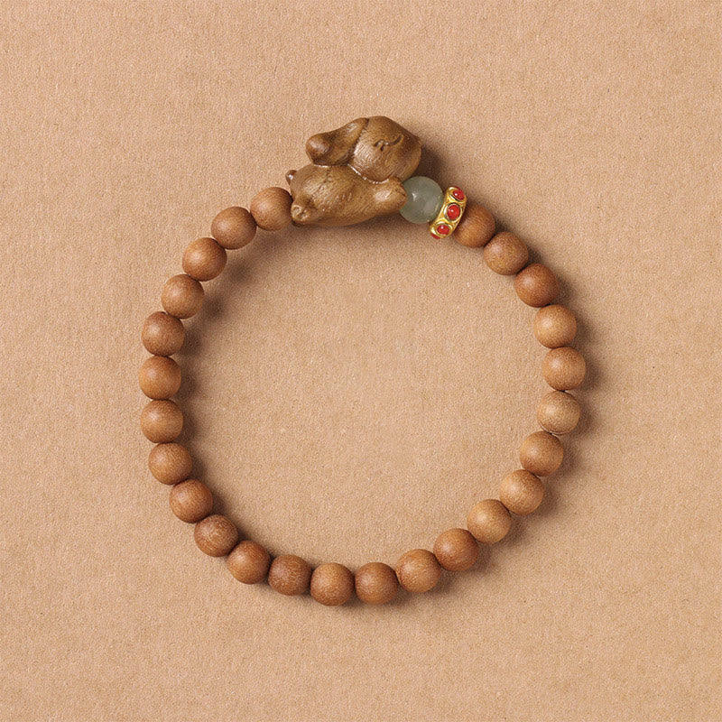 Bracelet positif en bois de santal vert et doré avec Buddha Stones et lapin mignon