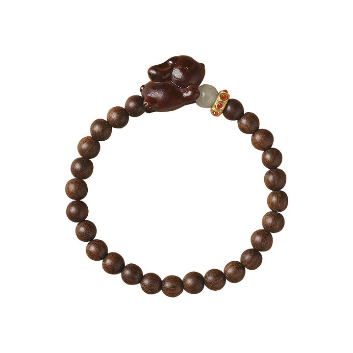 Bracelet positif en bois de santal vert et doré avec Buddha Stones et lapin mignon