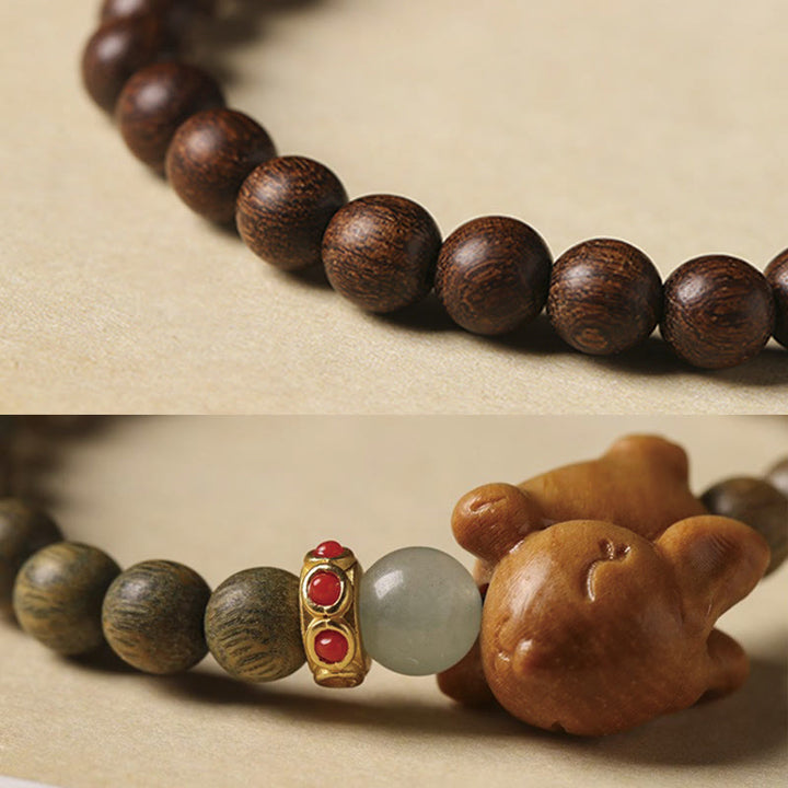 Bracelet positif en bois de santal vert et doré avec Buddha Stones et lapin mignon