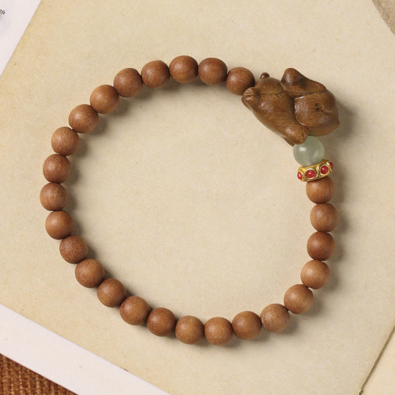 Bracelet positif en bois de santal vert et doré avec Buddha Stones et lapin mignon