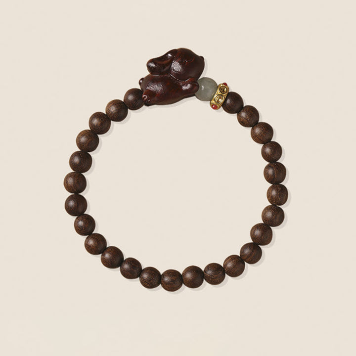 Bracelet positif en bois de santal vert et doré avec Buddha Stones et lapin mignon