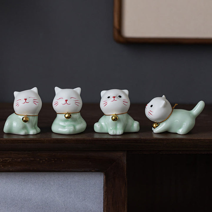 Figurine de Buddha Stones bonheur en céramique vert clair et blanc représentant un mini chat porte-bonheur - image 1