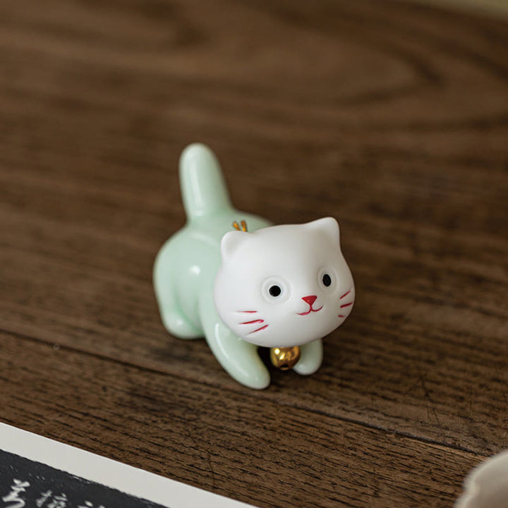Figurine de Buddha Stones bonheur en céramique vert clair et blanc représentant un mini chat porte-bonheur - image 15