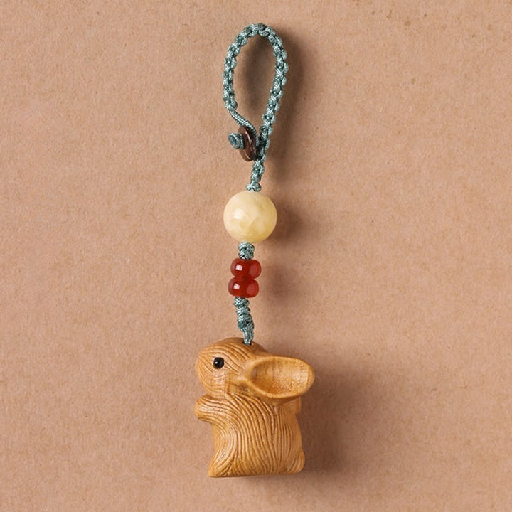 Buddha Stones en bois de santal, petite feuille, bois de santal rouge, mini lapin porte-bonheur, protection, décoration à suspendre pour téléphone