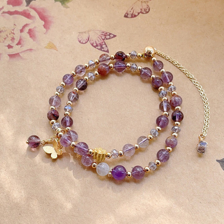 Bracelet double tour de méditation en améthyste et fleurs de papillon, Buddha Stones