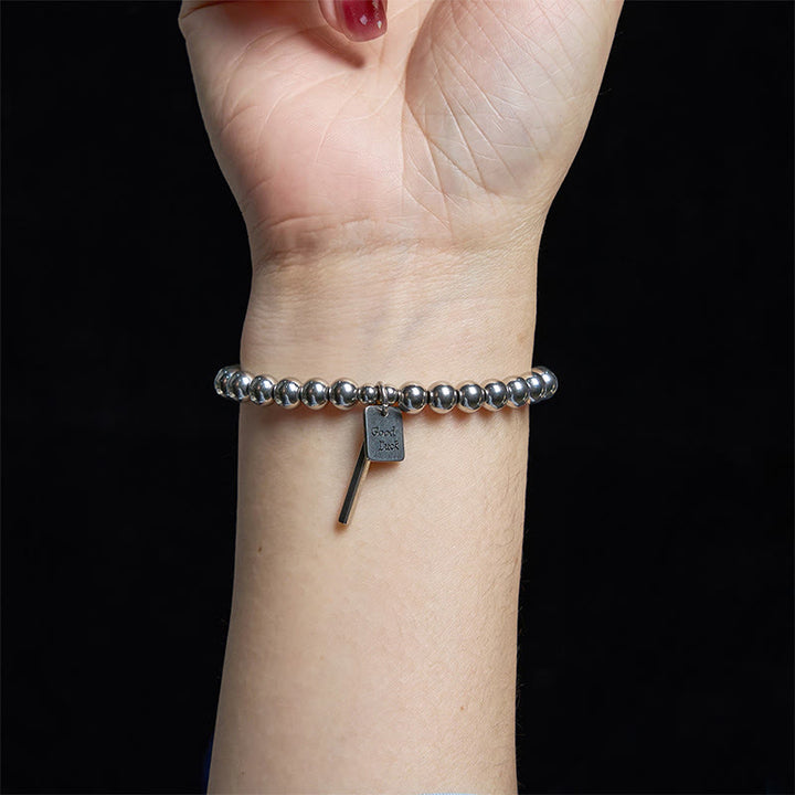 Bracelet porte-bonheur en acier titane et Buddha Stones