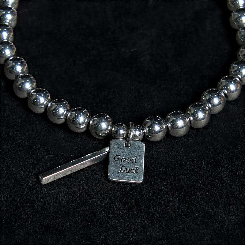 Bracelet porte-bonheur en acier titane et Buddha Stones