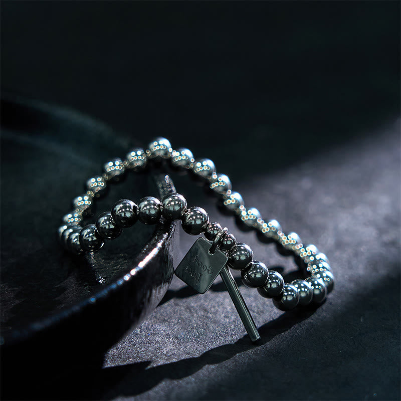 Bracelet porte-bonheur en acier titane et Buddha Stones