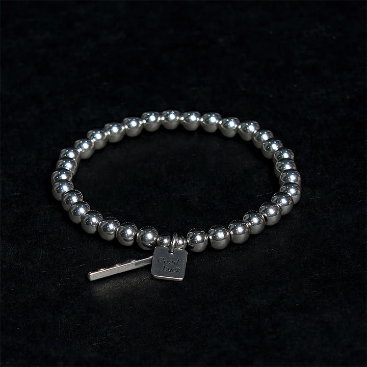 Bracelet porte-bonheur en acier titane et Buddha Stones