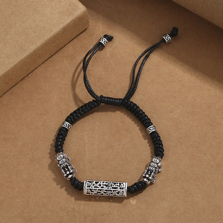 Bracelet tressé tibétain en cuivre avec Buddha Stones et cordon noir, protection Om Mani Padme Hum Pixiu