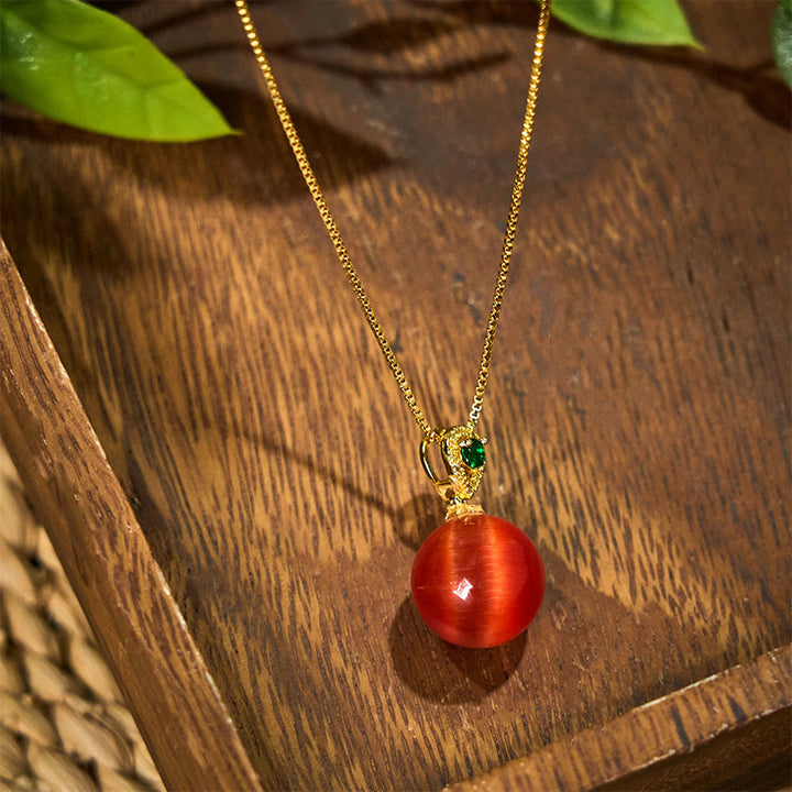 Collier avec pendentif boule ronde œil de chat en Buddha Stones