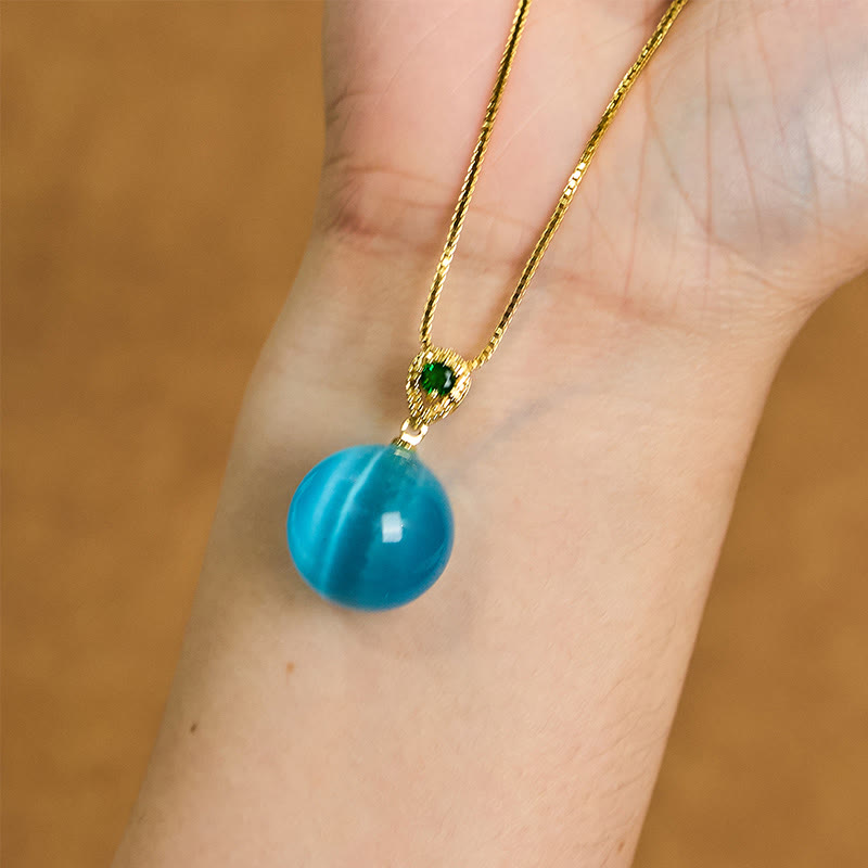 Collier avec pendentif boule ronde œil de chat en Buddha Stones