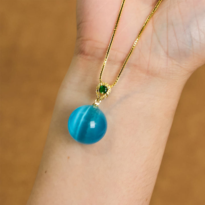Collier avec pendentif boule ronde œil de chat en Buddha Stones