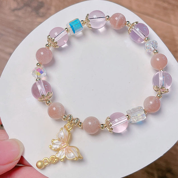 Bracelet de paix papillon en pierre de soleil améthyste naturelle de Buddha Stones