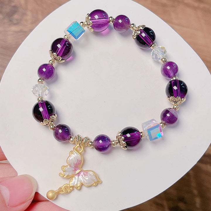 Bracelet de paix papillon en pierre de soleil améthyste naturelle de Buddha Stones