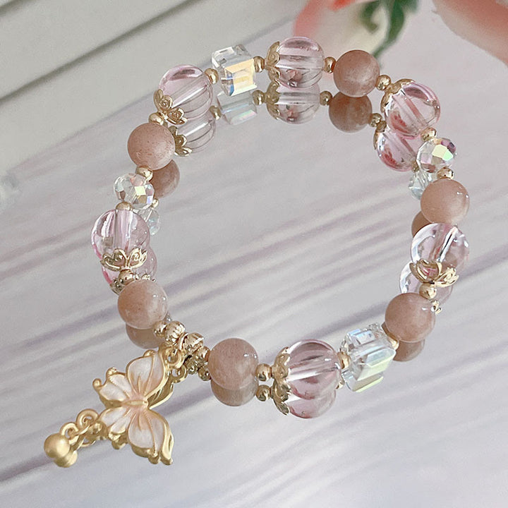 Bracelet de paix papillon en pierre de soleil améthyste naturelle de Buddha Stones
