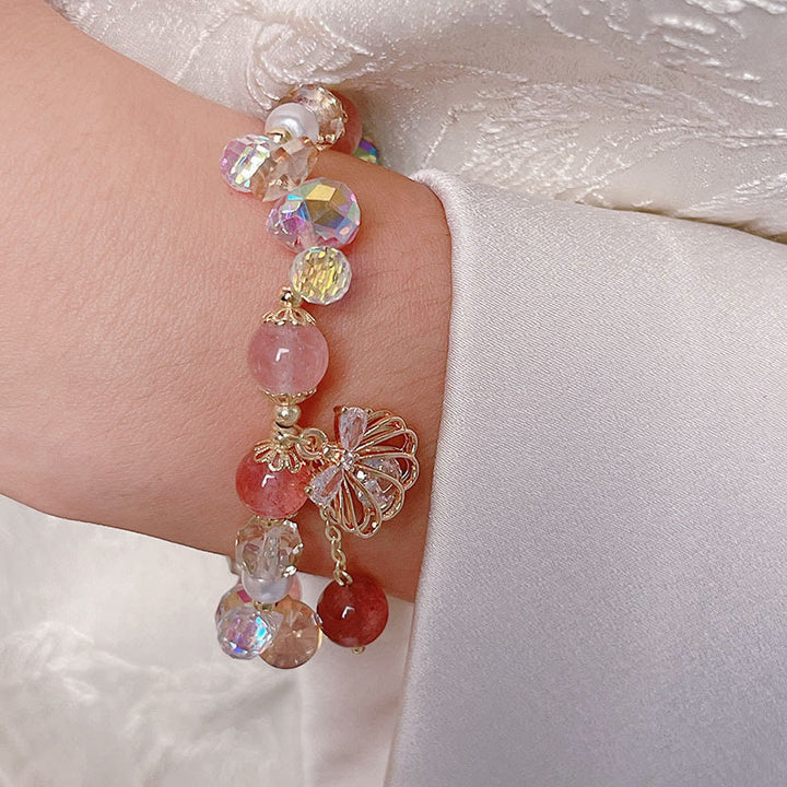 Bracelet positif en quartz fraise naturel et perles de coquillage Buddha Stones
