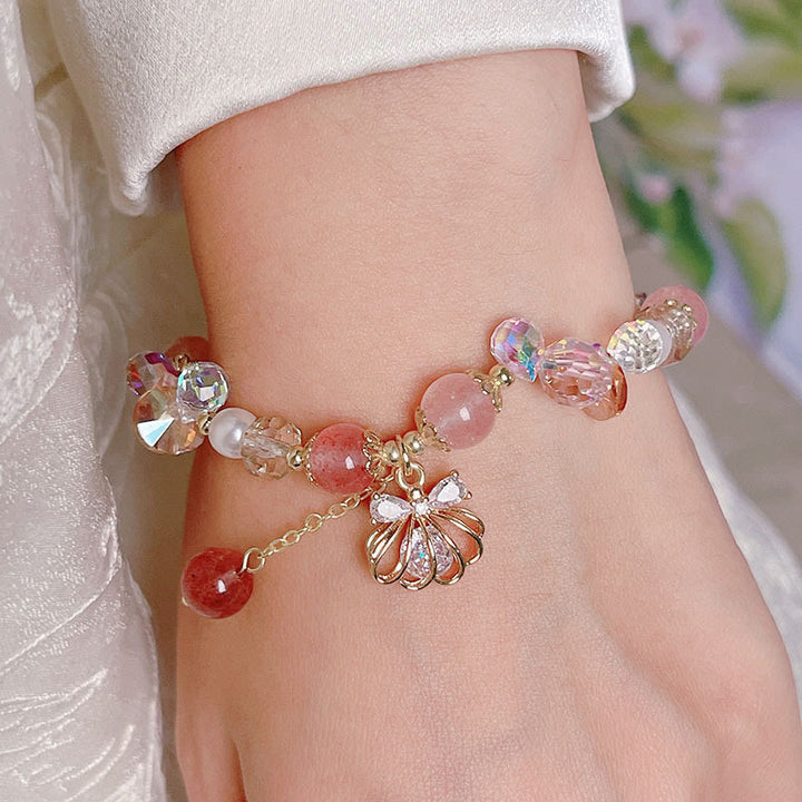 Bracelet positif en quartz fraise naturel et perles de coquillage Buddha Stones