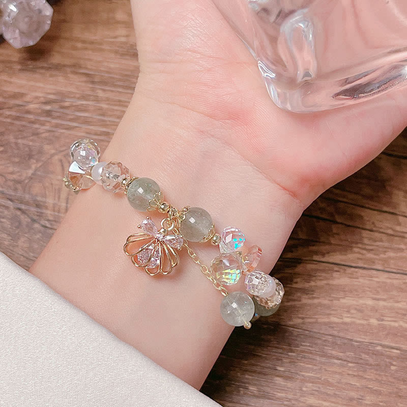 Bracelet positif en quartz fraise naturel et perles de coquillage Buddha Stones