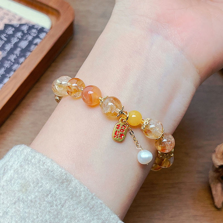 Bracelet Nafu Pleasure en perles de citrine naturelle et Buddha Stones