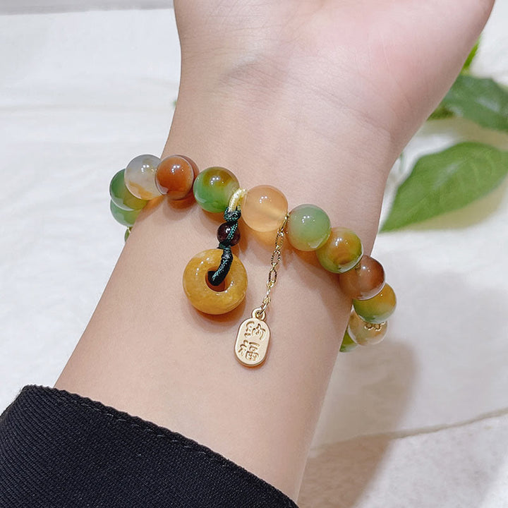 Bracelet d'équilibre Nafu avec boucle de paix et Buddha Stones , agate paon et topaze