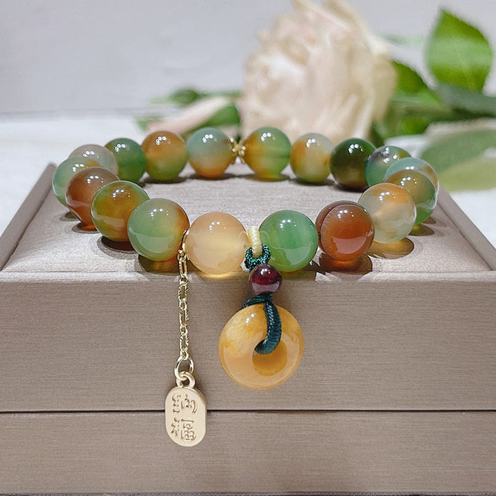 Bracelet d'équilibre Nafu avec boucle de paix et Buddha Stones , agate paon et topaze