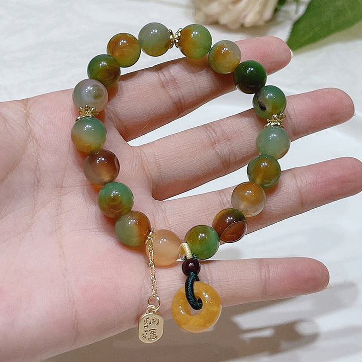 Bracelet d'équilibre Nafu avec boucle de paix et Buddha Stones , agate paon et topaze