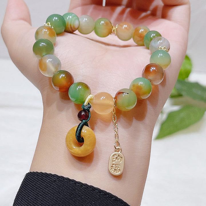 Bracelet d'équilibre Nafu avec boucle de paix et Buddha Stones , agate paon et topaze