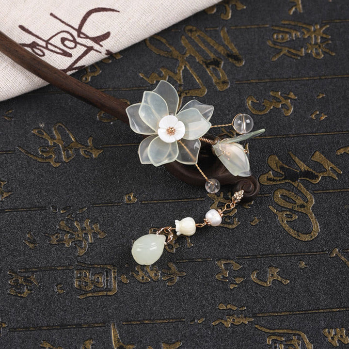 Épingle à cheveux en Buddha Stones, ébène, jade, coquillage, magnolia, pompon, bénédiction