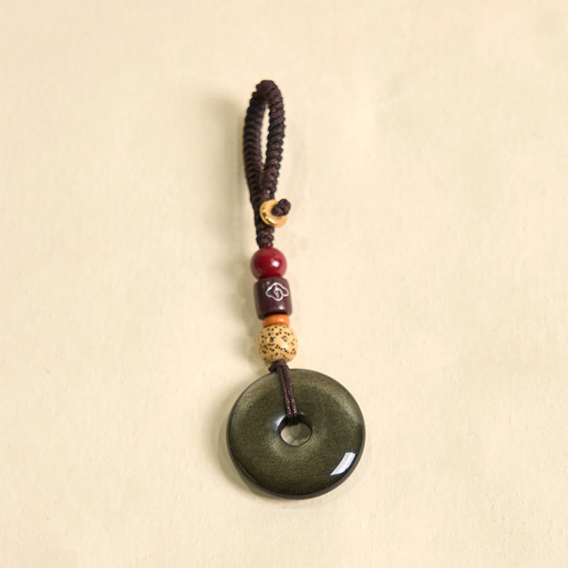 Porte-clés renforcé avec boucle de paix en obsidienne naturelle et Buddha Stones