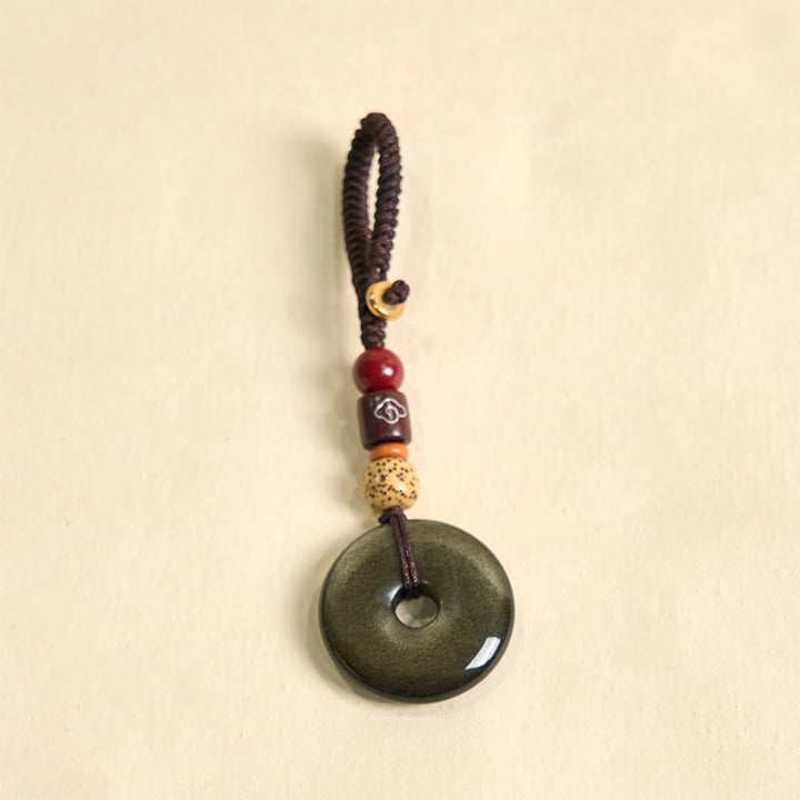 Porte-clés renforcé avec boucle de paix en obsidienne naturelle et Buddha Stones