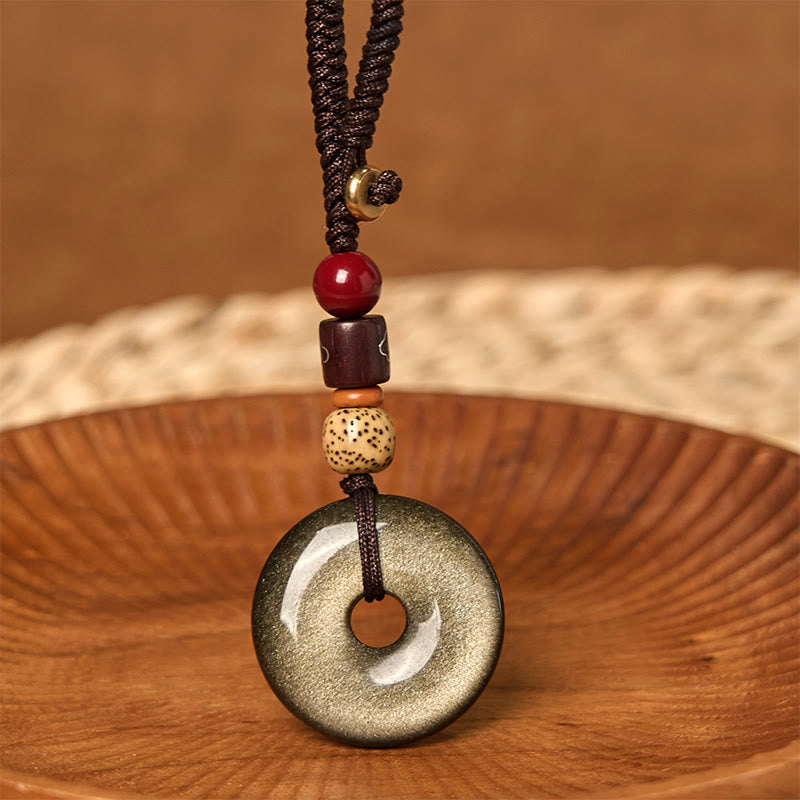 Porte-clés renforcé avec boucle de paix en obsidienne naturelle et Buddha Stones