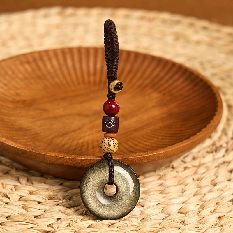 Porte-clés renforcé avec boucle de paix en obsidienne naturelle et Buddha Stones